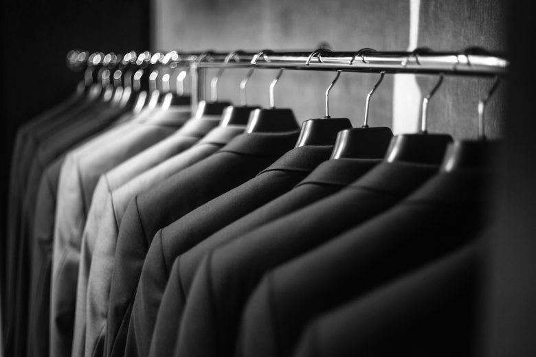 Row of suits on a rack